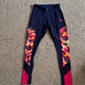 Women’s multi colored floral puma leggings size large